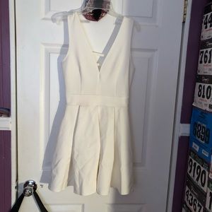 Deep V cut white short dress